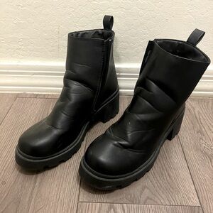 boots that add height about an inch height, has zippers.